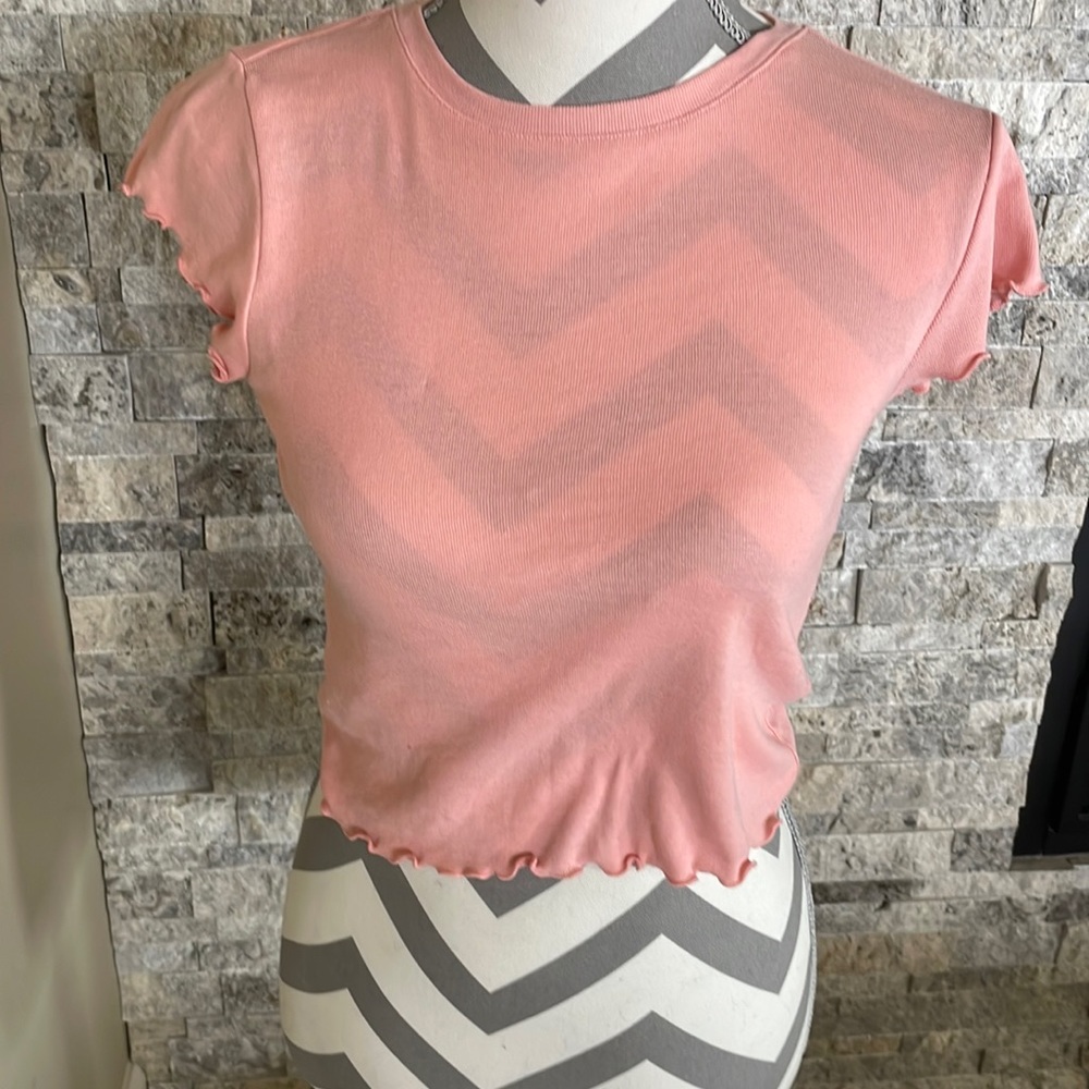 Pink short sleeve with ruffled ends